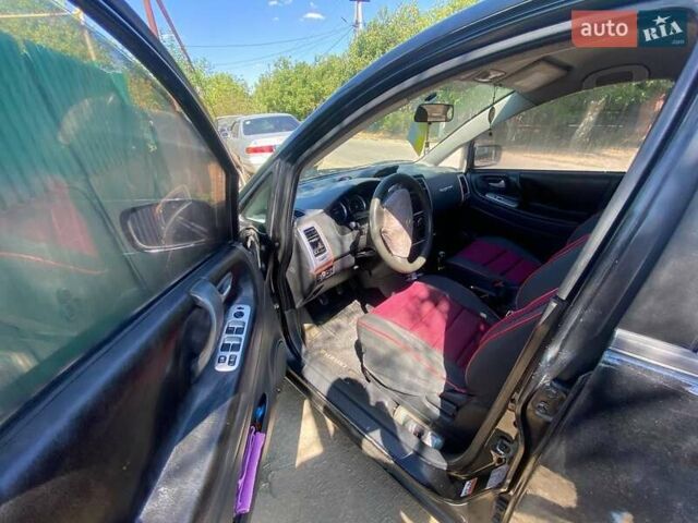 Черный Сузуки Лиана, объемом двигателя 1.6 л и пробегом 260 тыс. км за 4000 $, фото 3 на Automoto.ua