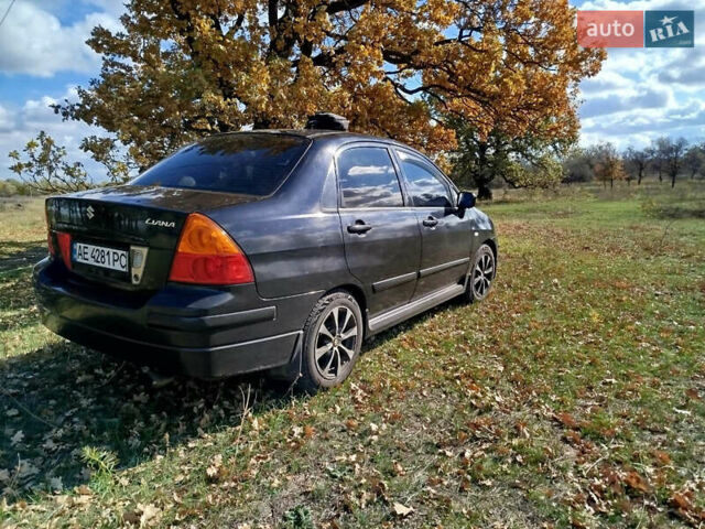 Черный Сузуки Лиана, объемом двигателя 1.6 л и пробегом 300 тыс. км за 3900 $, фото 2 на Automoto.ua