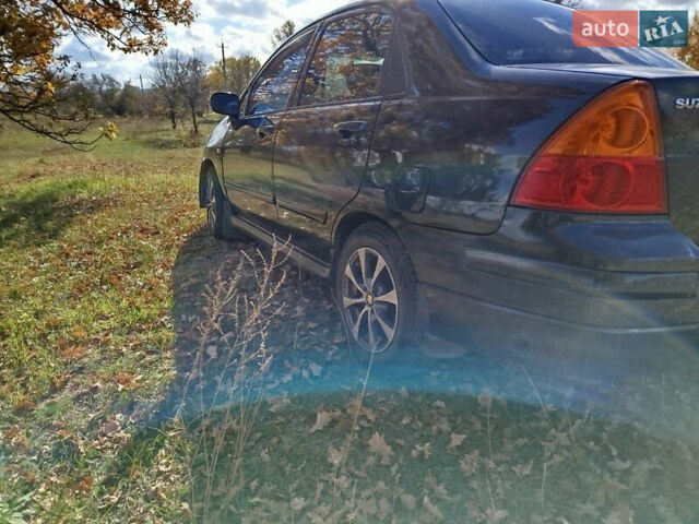 Черный Сузуки Лиана, объемом двигателя 1.6 л и пробегом 300 тыс. км за 3900 $, фото 3 на Automoto.ua