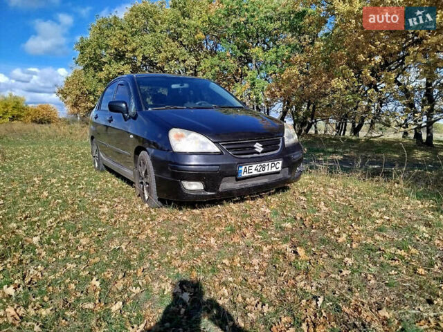 Черный Сузуки Лиана, объемом двигателя 1.6 л и пробегом 300 тыс. км за 3900 $, фото 1 на Automoto.ua