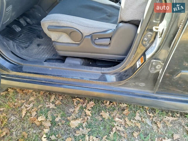 Черный Сузуки Лиана, объемом двигателя 1.6 л и пробегом 300 тыс. км за 3900 $, фото 11 на Automoto.ua