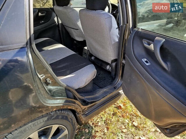 Черный Сузуки Лиана, объемом двигателя 1.6 л и пробегом 300 тыс. км за 3900 $, фото 8 на Automoto.ua