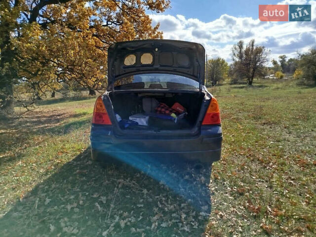 Черный Сузуки Лиана, объемом двигателя 1.6 л и пробегом 300 тыс. км за 3900 $, фото 5 на Automoto.ua