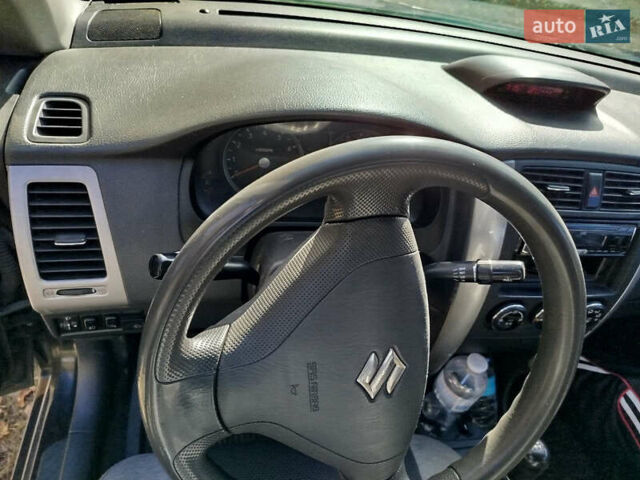 Черный Сузуки Лиана, объемом двигателя 1.6 л и пробегом 300 тыс. км за 3900 $, фото 18 на Automoto.ua