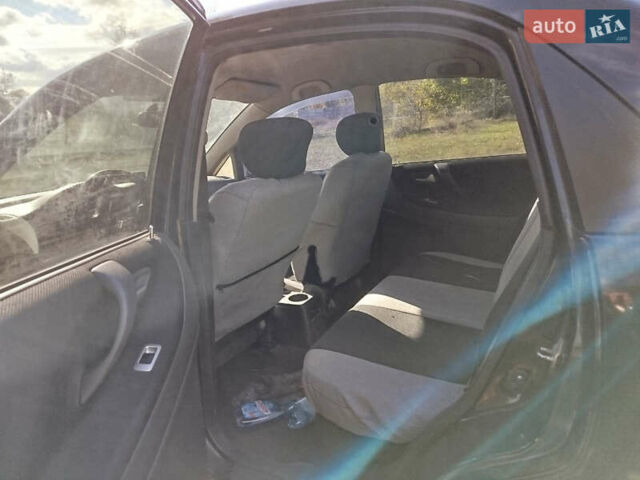 Черный Сузуки Лиана, объемом двигателя 1.6 л и пробегом 300 тыс. км за 3900 $, фото 12 на Automoto.ua