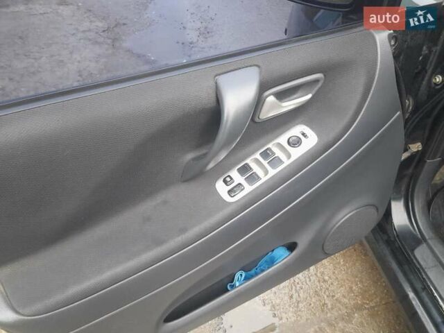 Черный Сузуки Лиана, объемом двигателя 1.59 л и пробегом 235 тыс. км за 3800 $, фото 6 на Automoto.ua