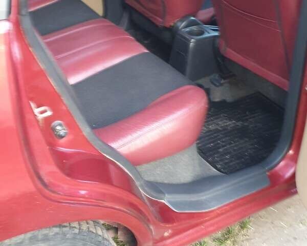 Красный Сузуки Лиана, объемом двигателя 1.6 л и пробегом 290 тыс. км за 3500 $, фото 11 на Automoto.ua