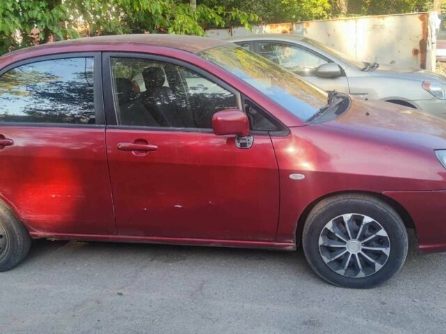 Червоний Сузукі Ліана, об'ємом двигуна 1.6 л та пробігом 390 тис. км за 2039 $, фото 5 на Automoto.ua