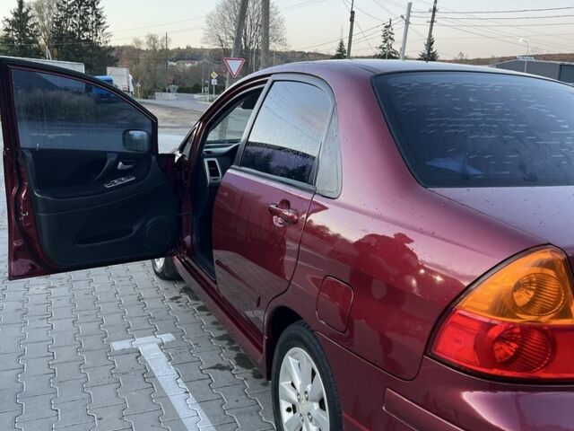 Червоний Сузукі Ліана, об'ємом двигуна 1.4 л та пробігом 235 тис. км за 3150 $, фото 4 на Automoto.ua