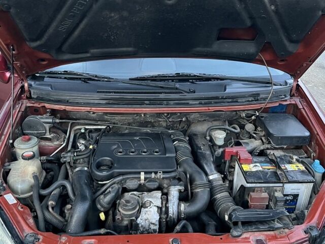 Червоний Сузукі Ліана, об'ємом двигуна 1.4 л та пробігом 235 тис. км за 3150 $, фото 7 на Automoto.ua