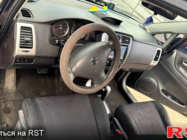 Сузуки Лиана, объемом двигателя 1.6 л и пробегом 237 тыс. км за 3900 $, фото 5 на Automoto.ua