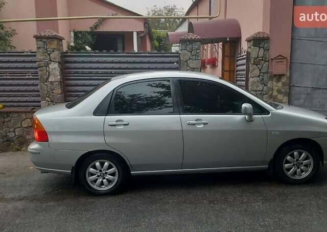 Серый Сузуки Лиана, объемом двигателя 1.6 л и пробегом 140 тыс. км за 4500 $, фото 5 на Automoto.ua
