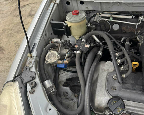 Серый Сузуки Лиана, объемом двигателя 1.6 л и пробегом 186 тыс. км за 5399 $, фото 27 на Automoto.ua