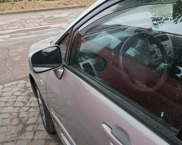 Серый Сузуки Лиана, объемом двигателя 1.4 л и пробегом 189 тыс. км за 5200 $, фото 3 на Automoto.ua