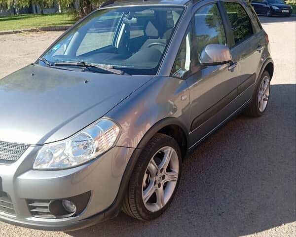 Серый Сузуки Лиана, объемом двигателя 1.59 л и пробегом 208 тыс. км за 7850 $, фото 3 на Automoto.ua