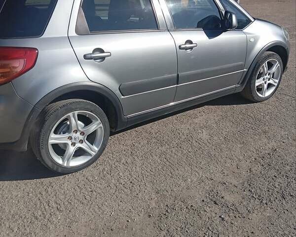 Серый Сузуки Лиана, объемом двигателя 1.59 л и пробегом 208 тыс. км за 7850 $, фото 7 на Automoto.ua