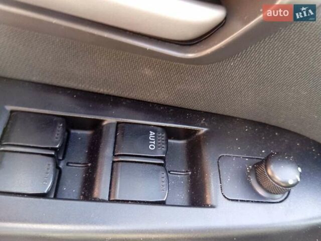 Серый Сузуки Лиана, объемом двигателя 1.59 л и пробегом 208 тыс. км за 7850 $, фото 2 на Automoto.ua