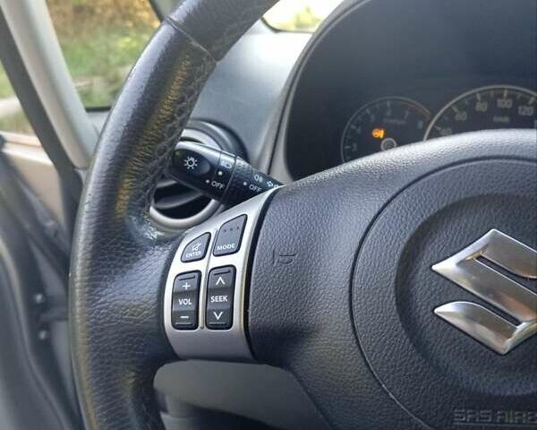 Серый Сузуки Лиана, объемом двигателя 1.59 л и пробегом 208 тыс. км за 7850 $, фото 13 на Automoto.ua