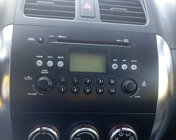 Серый Сузуки Лиана, объемом двигателя 1.59 л и пробегом 208 тыс. км за 7850 $, фото 12 на Automoto.ua