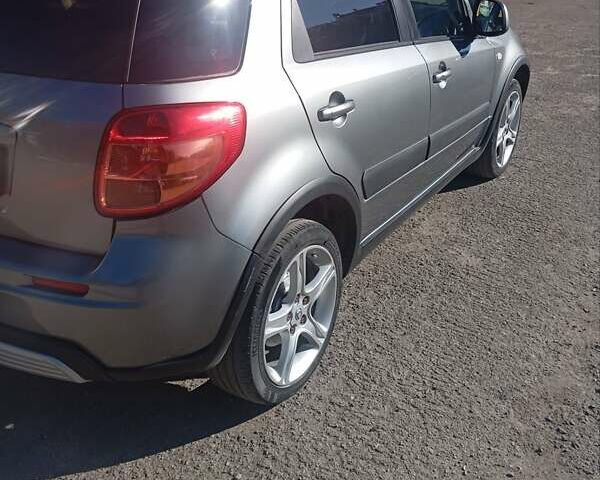 Серый Сузуки Лиана, объемом двигателя 1.59 л и пробегом 208 тыс. км за 7850 $, фото 6 на Automoto.ua