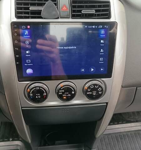 Синий Сузуки Лиана, объемом двигателя 1.6 л и пробегом 252 тыс. км за 3700 $, фото 12 на Automoto.ua