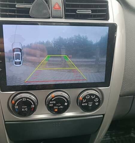 Синий Сузуки Лиана, объемом двигателя 1.6 л и пробегом 252 тыс. км за 3700 $, фото 16 на Automoto.ua