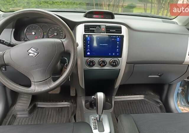 Синий Сузуки Лиана, объемом двигателя 1.6 л и пробегом 252 тыс. км за 3700 $, фото 10 на Automoto.ua