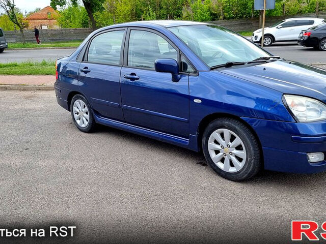 Синий Сузуки Лиана, объемом двигателя 1.6 л и пробегом 250 тыс. км за 4500 $, фото 2 на Automoto.ua