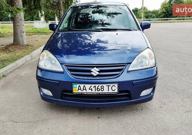 Синий Сузуки Лиана, объемом двигателя 1.59 л и пробегом 258 тыс. км за 3950 $, фото 2 на Automoto.ua