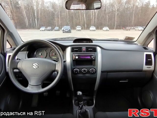 Синий Сузуки Лиана, объемом двигателя 1.6 л и пробегом 257 тыс. км за 4700 $, фото 5 на Automoto.ua