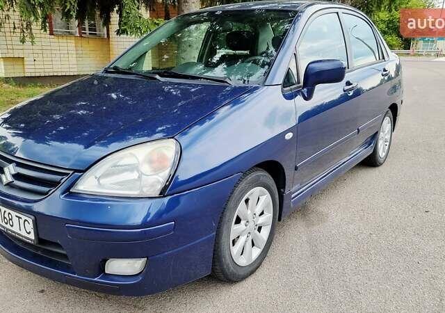 Синий Сузуки Лиана, объемом двигателя 1.59 л и пробегом 258 тыс. км за 3950 $, фото 3 на Automoto.ua