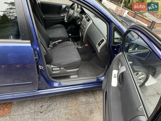 Синий Сузуки Лиана, объемом двигателя 1.4 л и пробегом 158 тыс. км за 4800 $, фото 11 на Automoto.ua
