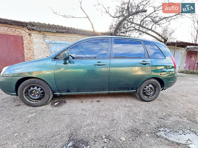 Зеленый Сузуки Лиана, объемом двигателя 1.6 л и пробегом 218 тыс. км за 3300 $, фото 9 на Automoto.ua