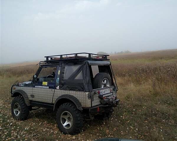 Серый Сузуки Эс Джей, объемом двигателя 1.3 л и пробегом 110 тыс. км за 7999 $, фото 2 на Automoto.ua