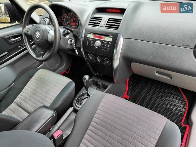 Белый Сузуки СХ4, объемом двигателя 1.6 л и пробегом 192 тыс. км за 5490 $, фото 46 на Automoto.ua