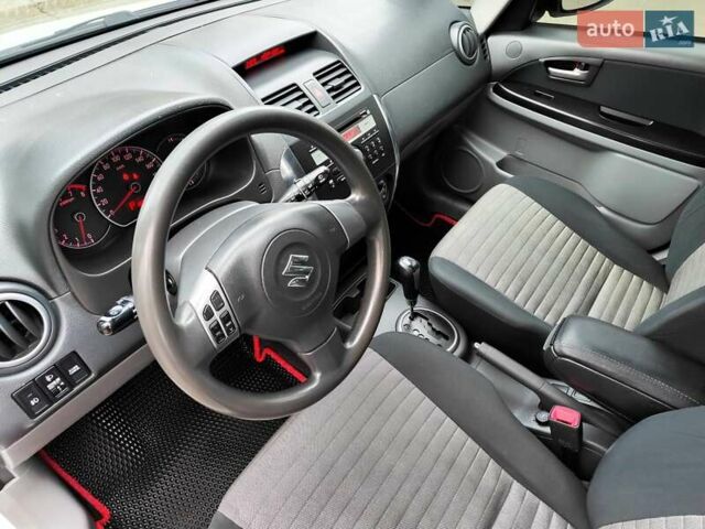 Белый Сузуки СХ4, объемом двигателя 1.6 л и пробегом 192 тыс. км за 5490 $, фото 32 на Automoto.ua