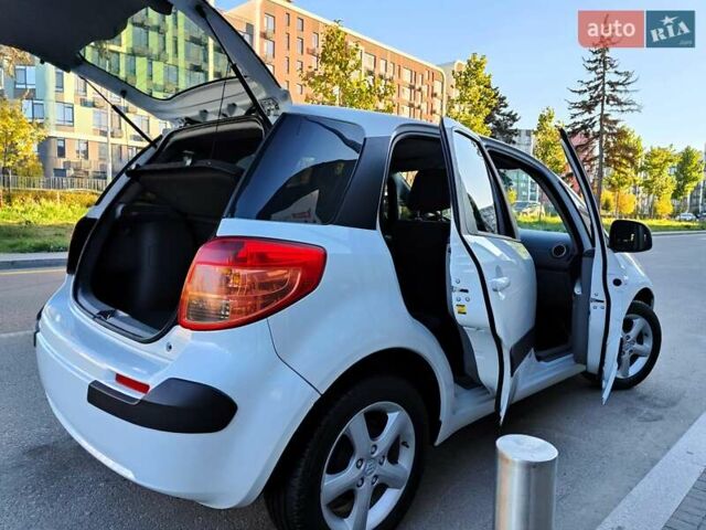 Белый Сузуки СХ4, объемом двигателя 1.6 л и пробегом 192 тыс. км за 5990 $, фото 22 на Automoto.ua