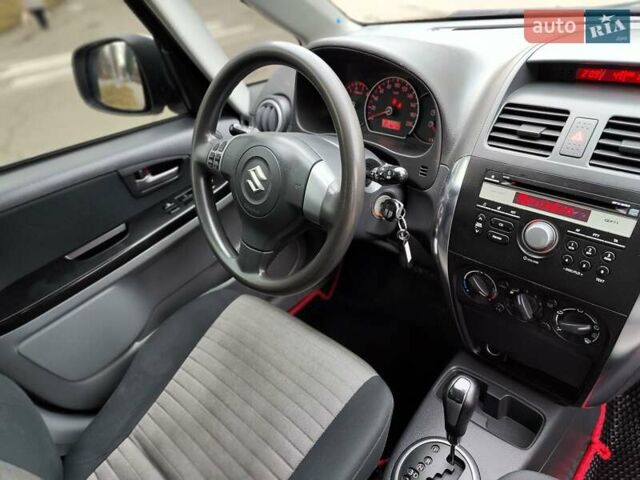 Белый Сузуки СХ4, объемом двигателя 1.6 л и пробегом 192 тыс. км за 5490 $, фото 48 на Automoto.ua