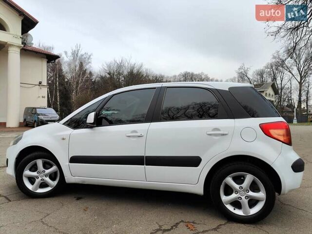Белый Сузуки СХ4, объемом двигателя 1.6 л и пробегом 192 тыс. км за 5490 $, фото 9 на Automoto.ua