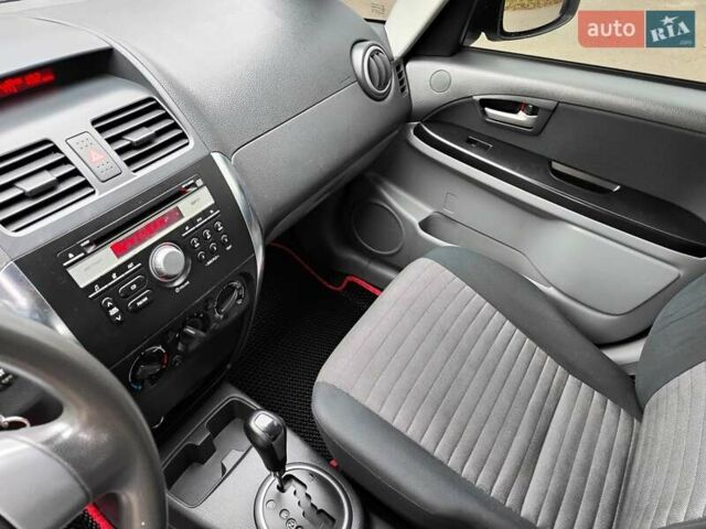 Белый Сузуки СХ4, объемом двигателя 1.6 л и пробегом 192 тыс. км за 5490 $, фото 35 на Automoto.ua