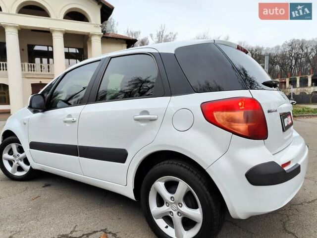 Белый Сузуки СХ4, объемом двигателя 1.6 л и пробегом 192 тыс. км за 5490 $, фото 10 на Automoto.ua