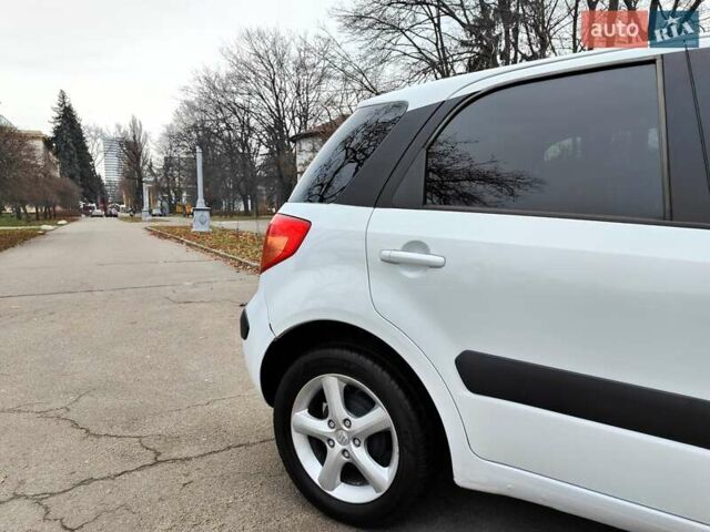 Белый Сузуки СХ4, объемом двигателя 1.6 л и пробегом 192 тыс. км за 5490 $, фото 26 на Automoto.ua