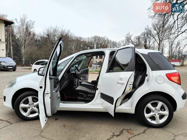 Белый Сузуки СХ4, объемом двигателя 1.6 л и пробегом 192 тыс. км за 5490 $, фото 7 на Automoto.ua