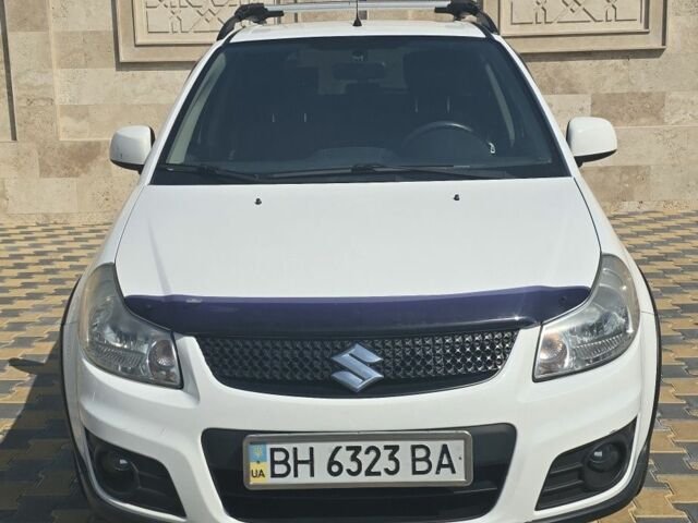 Белый Сузуки СХ4, объемом двигателя 1.6 л и пробегом 102 тыс. км за 10100 $, фото 1 на Automoto.ua