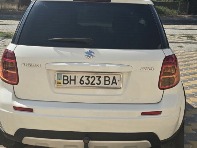 Белый Сузуки СХ4, объемом двигателя 1.6 л и пробегом 102 тыс. км за 10100 $, фото 3 на Automoto.ua