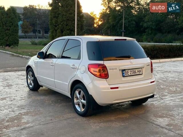 Белый Сузуки СХ4, объемом двигателя 1.59 л и пробегом 124 тыс. км за 8000 $, фото 5 на Automoto.ua