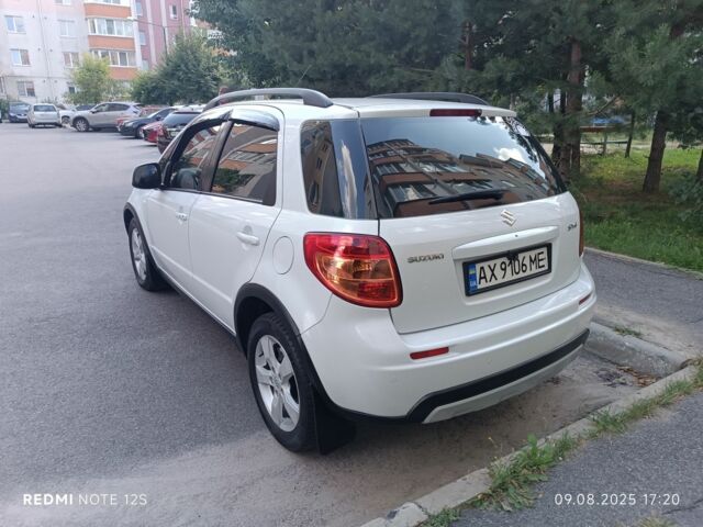 Белый Сузуки СХ4, объемом двигателя 1.6 л и пробегом 125 тыс. км за 9400 $, фото 7 на Automoto.ua