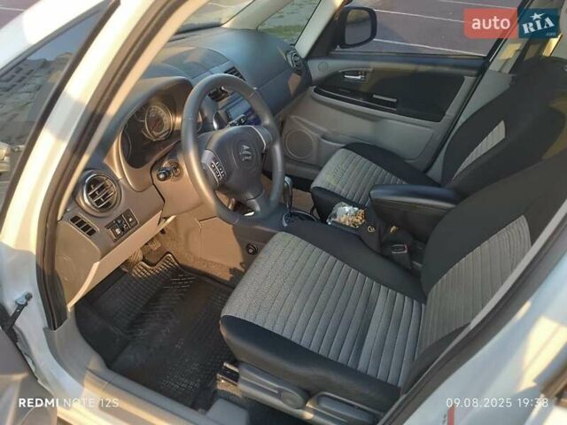 Білий Сузукі СХ4, об'ємом двигуна 1.59 л та пробігом 125 тис. км за 9459 $, фото 2 на Automoto.ua