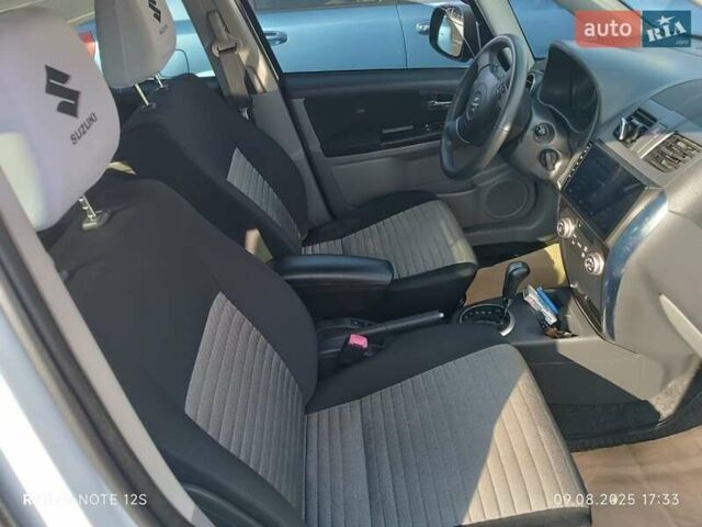Білий Сузукі СХ4, об'ємом двигуна 1.59 л та пробігом 125 тис. км за 9459 $, фото 12 на Automoto.ua