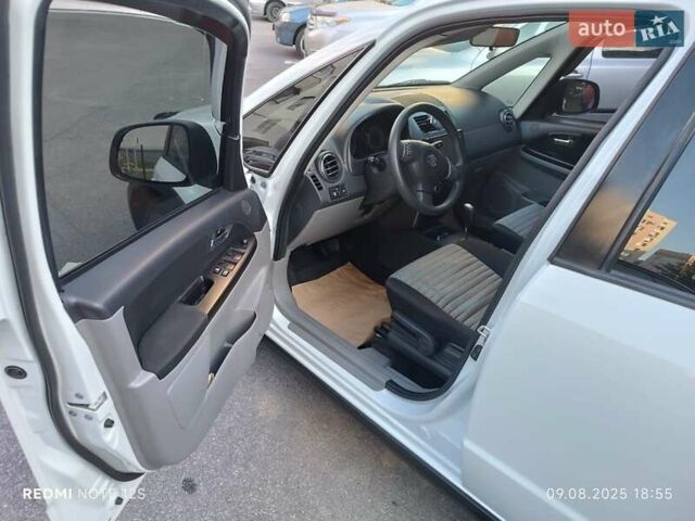 Білий Сузукі СХ4, об'ємом двигуна 1.59 л та пробігом 125 тис. км за 9459 $, фото 14 на Automoto.ua